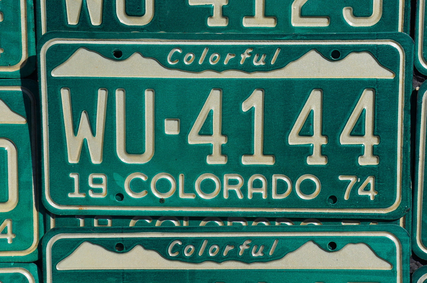 One or More - 1974 Colorful COLORADO SNOW MOUNTAINS Green License Plate