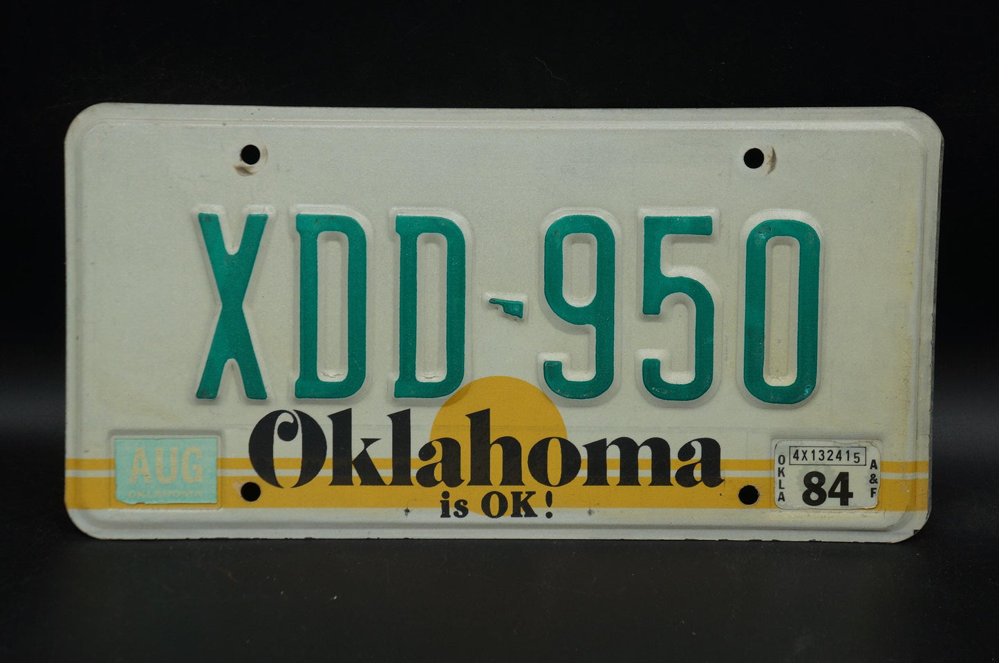 1984 Oklahoma IS OK! Yellow Sun Vintage License Plate # XDD - 950
