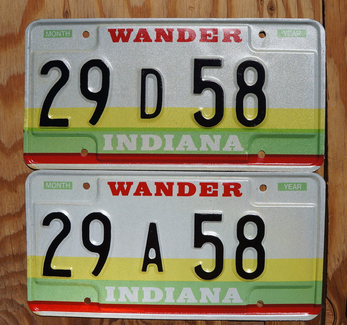 1980s Indiana Wander License Plate Pair: Yellow, Green, and Red Stripes