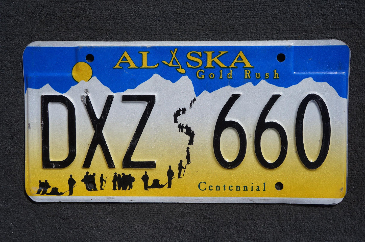 Alaska Centennial Gold Rush License Plate # DXZ 660