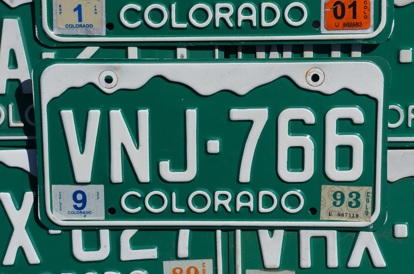 One or More - COLORADO GREEN MOUNTAINS License Plate
