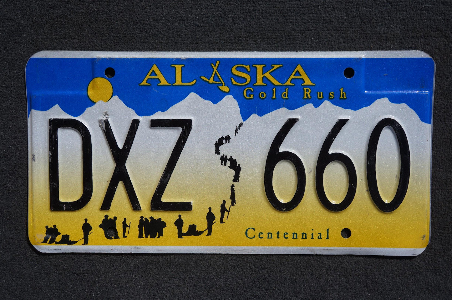 Alaska Centennial Gold Rush License Plate # DXZ 660