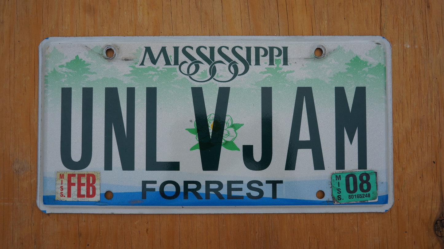 2008 Mississippi FORREST County Magnolia Flower Graphic License Plate # UNL V JAM
