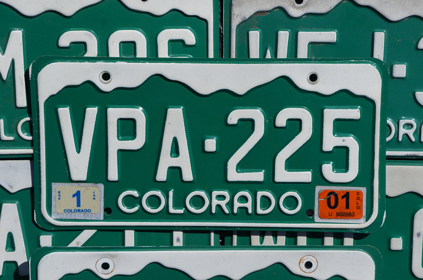 One or More - COLORADO GREEN MOUNTAINS License Plate