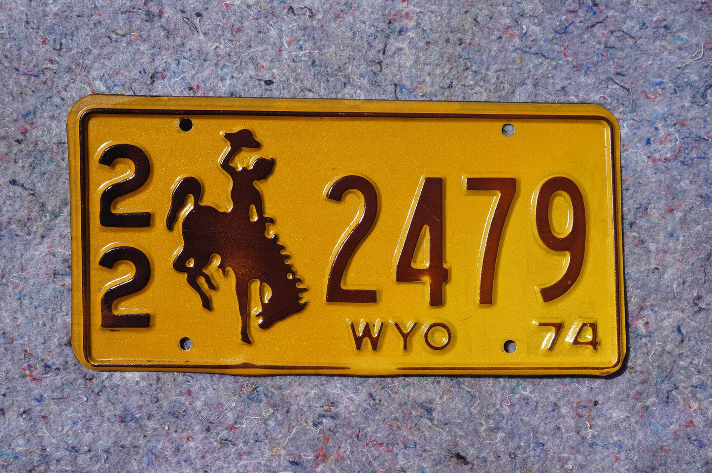 1974 Wyoming Teton County License Plate # 22 - 2479 - Cowboy & Horse - Yellowstone