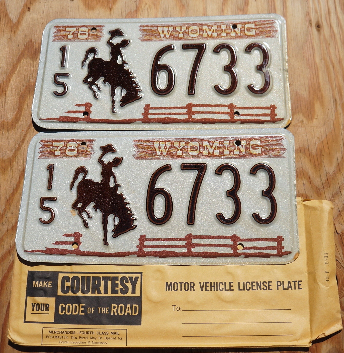 1978 Wyoming Cowboy License Plate Pair: Horse Fence Design