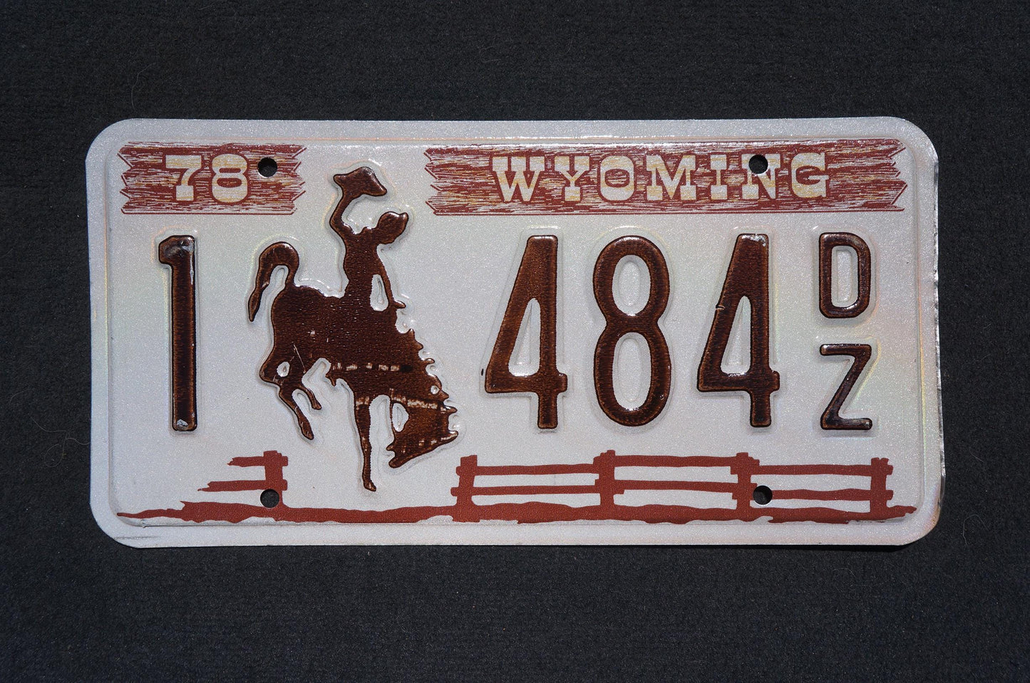 1978 Wyoming Cowboy Horse Fence Brown License Plate # 484 DZ