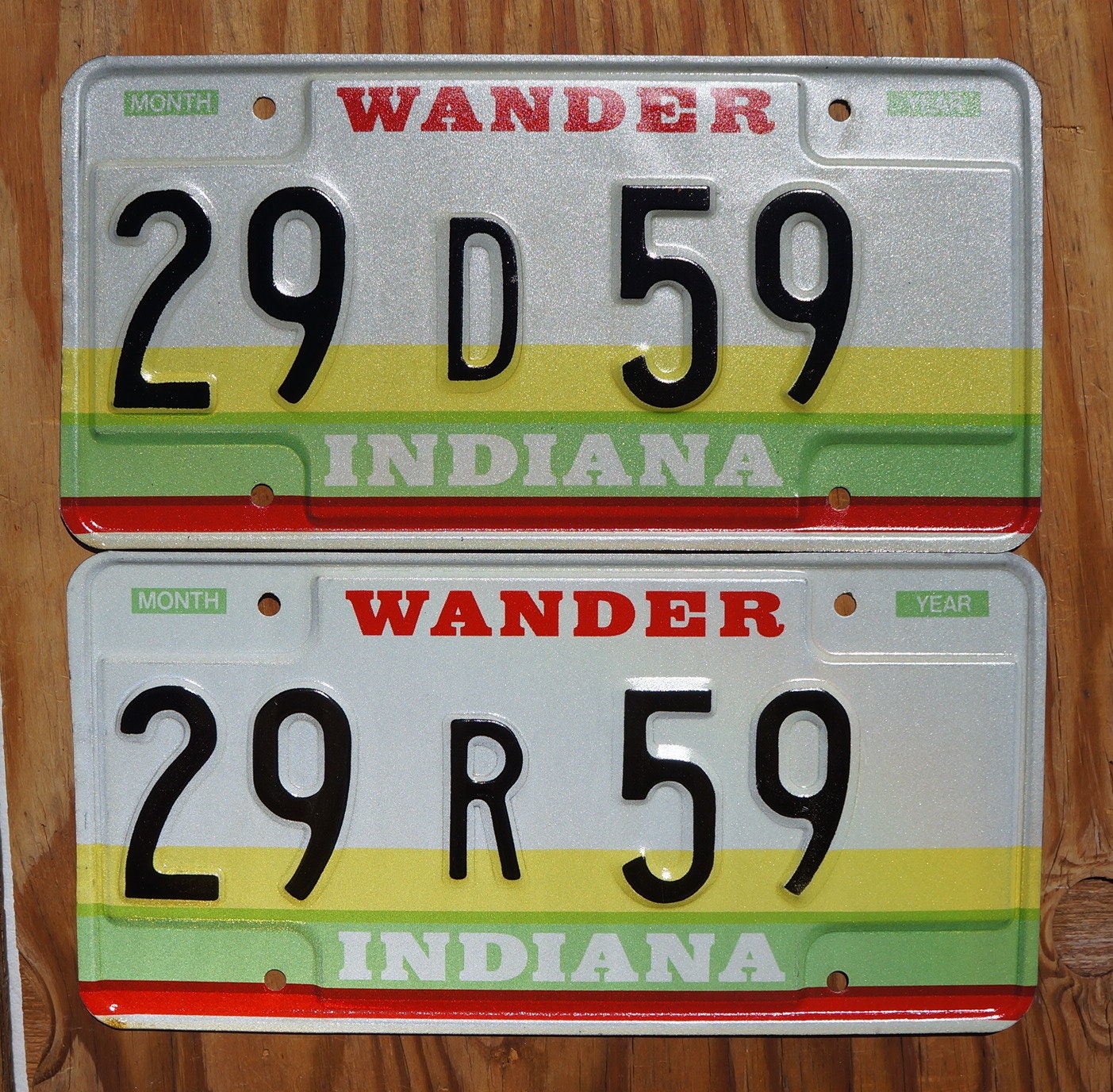 1980s Indiana Wander License Plate Pair: Yellow, Green, and Red Stripes