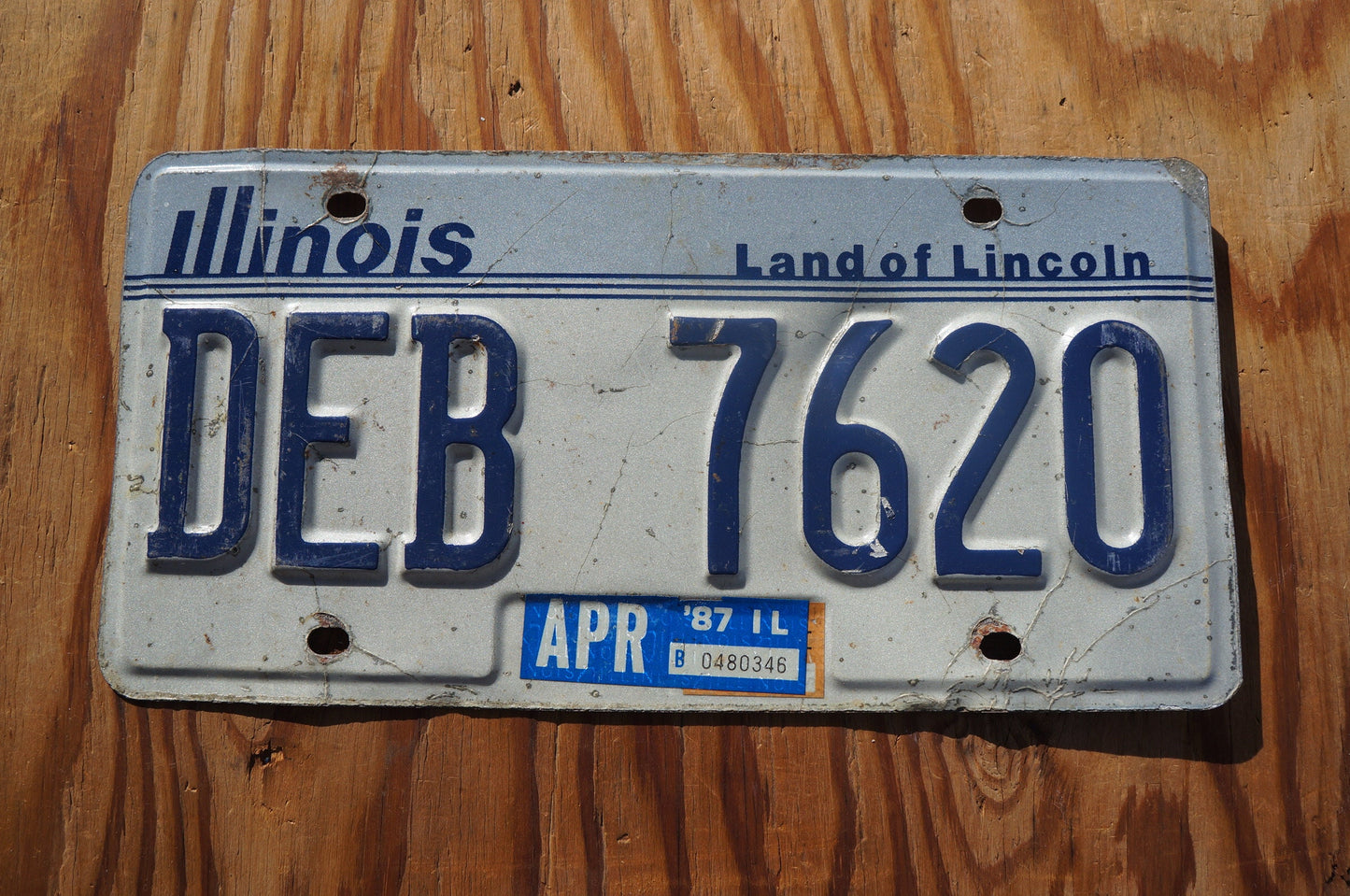 1987 Illinois White License Plate - Land of Lincoln # DEB 7620