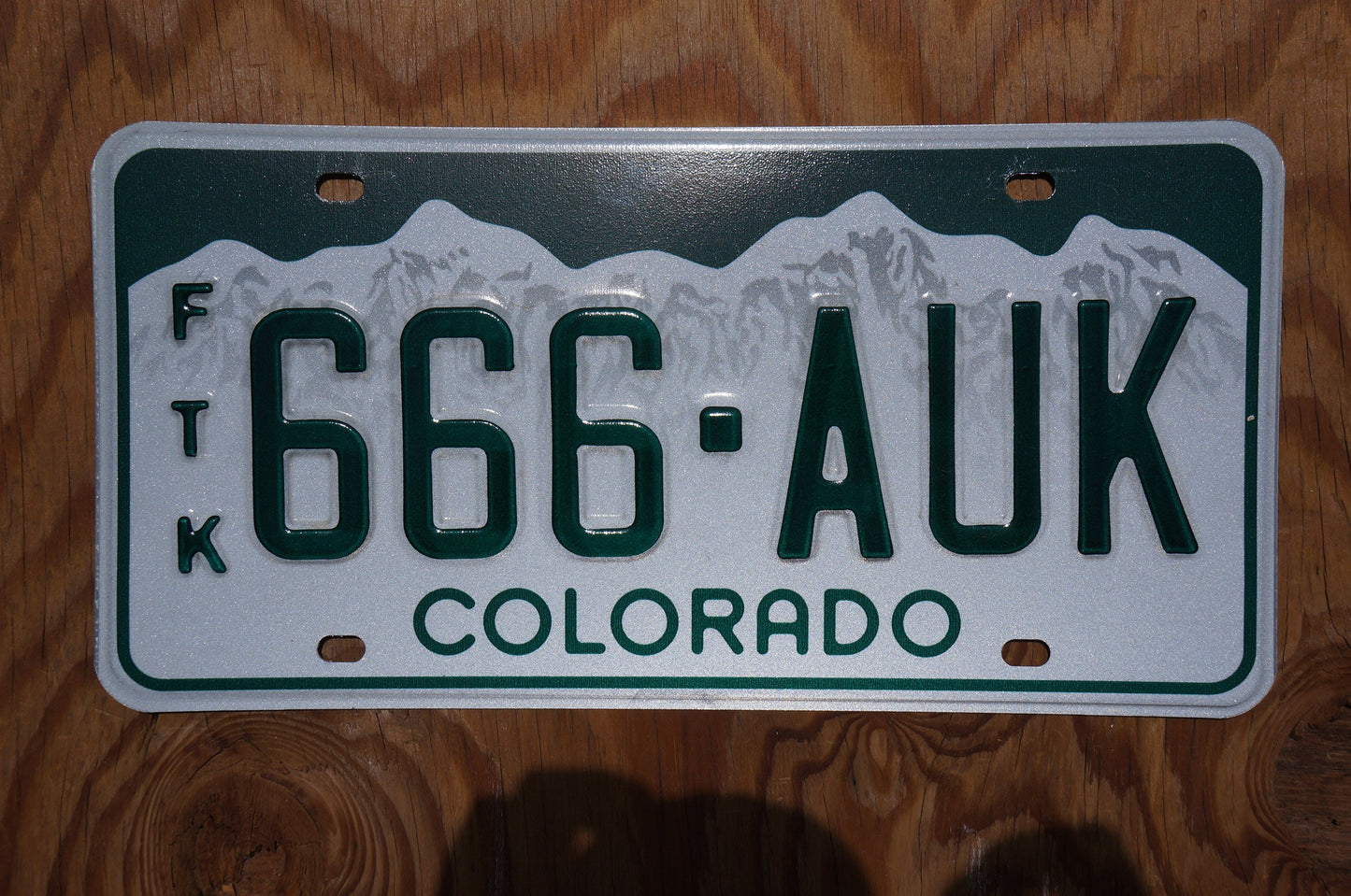 Colorado Snow Mountains Green License Plates # 666 - AUK