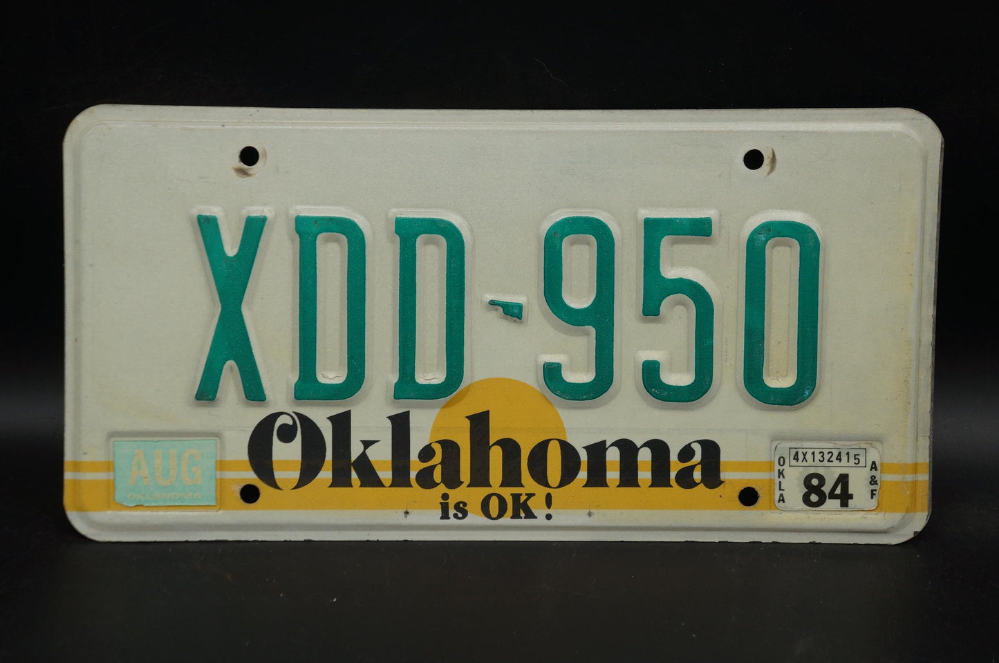 1984 Oklahoma IS OK! Yellow Sun Vintage License Plate # XDD - 950