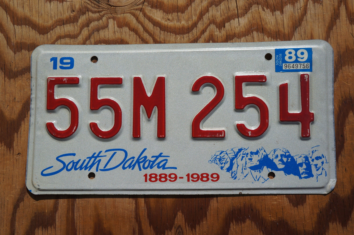 1989 South Dakota Centennial Mt Rushmore License Plate