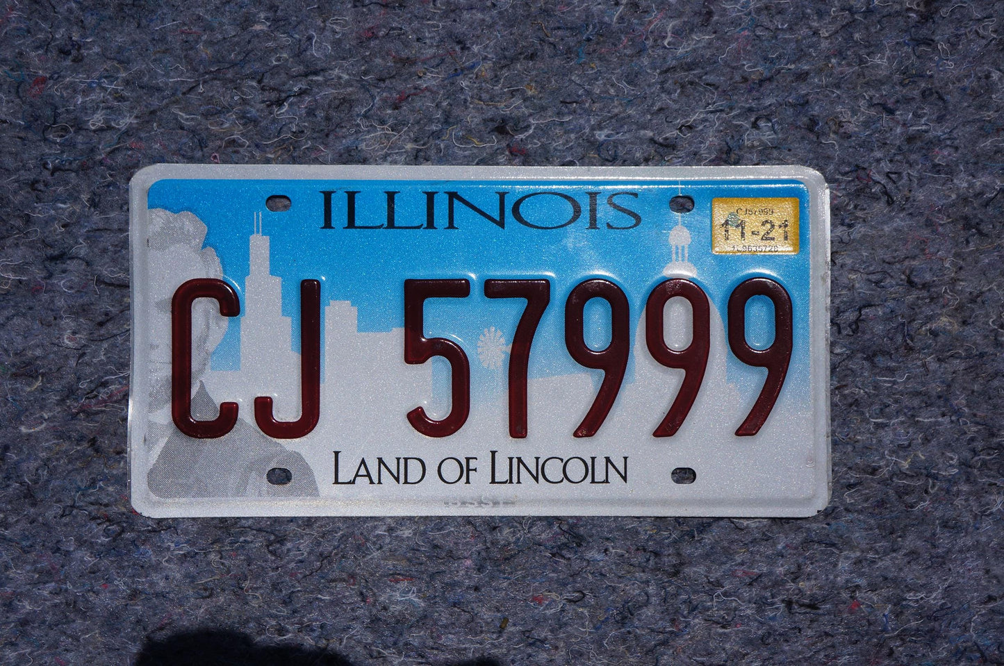 ILLINOIS License Plate Land of Lincoln Blue Graphic License Plate Tag # CJ 57999