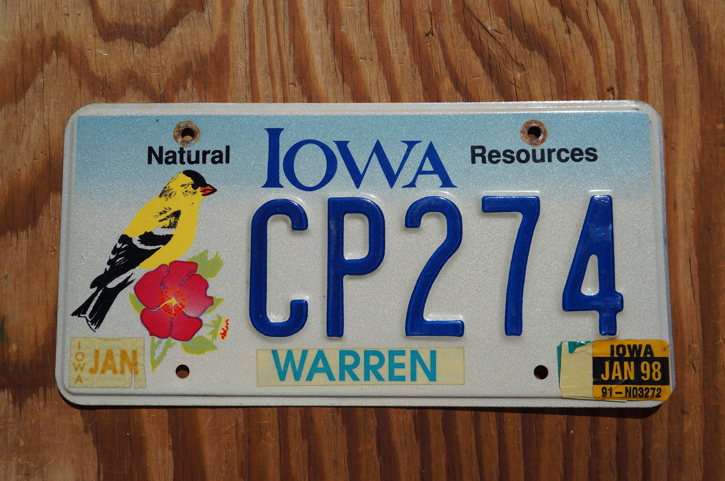 1998 Iowa NATURAL RESOURCES Graphic License Plate - Yellow Bird Red Flower
