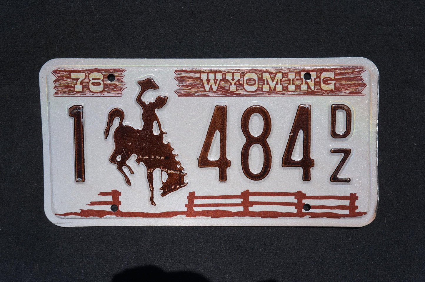 1978 Wyoming Cowboy Horse Fence Brown License Plate # 484 DZ