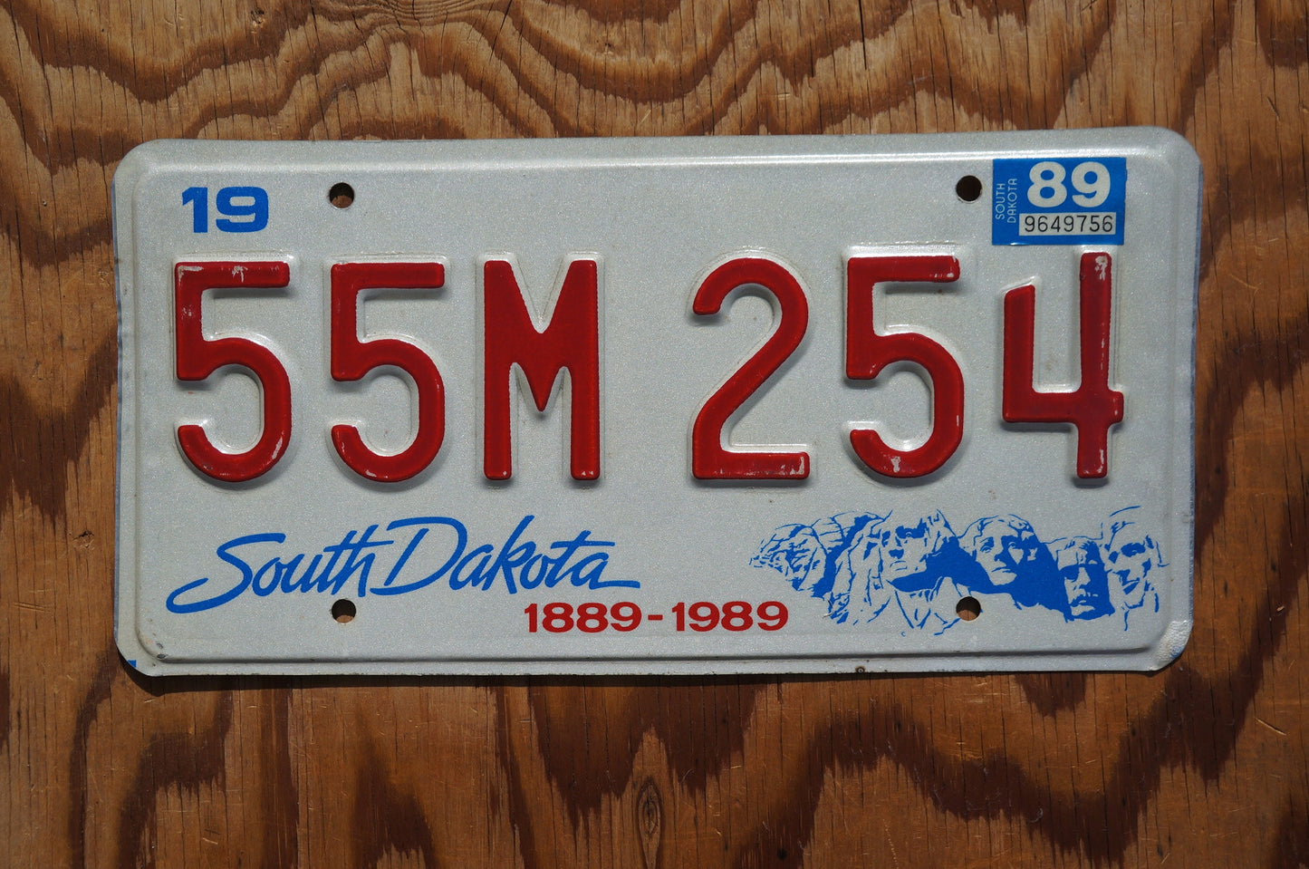 1989 South Dakota Centennial Mt Rushmore License Plate