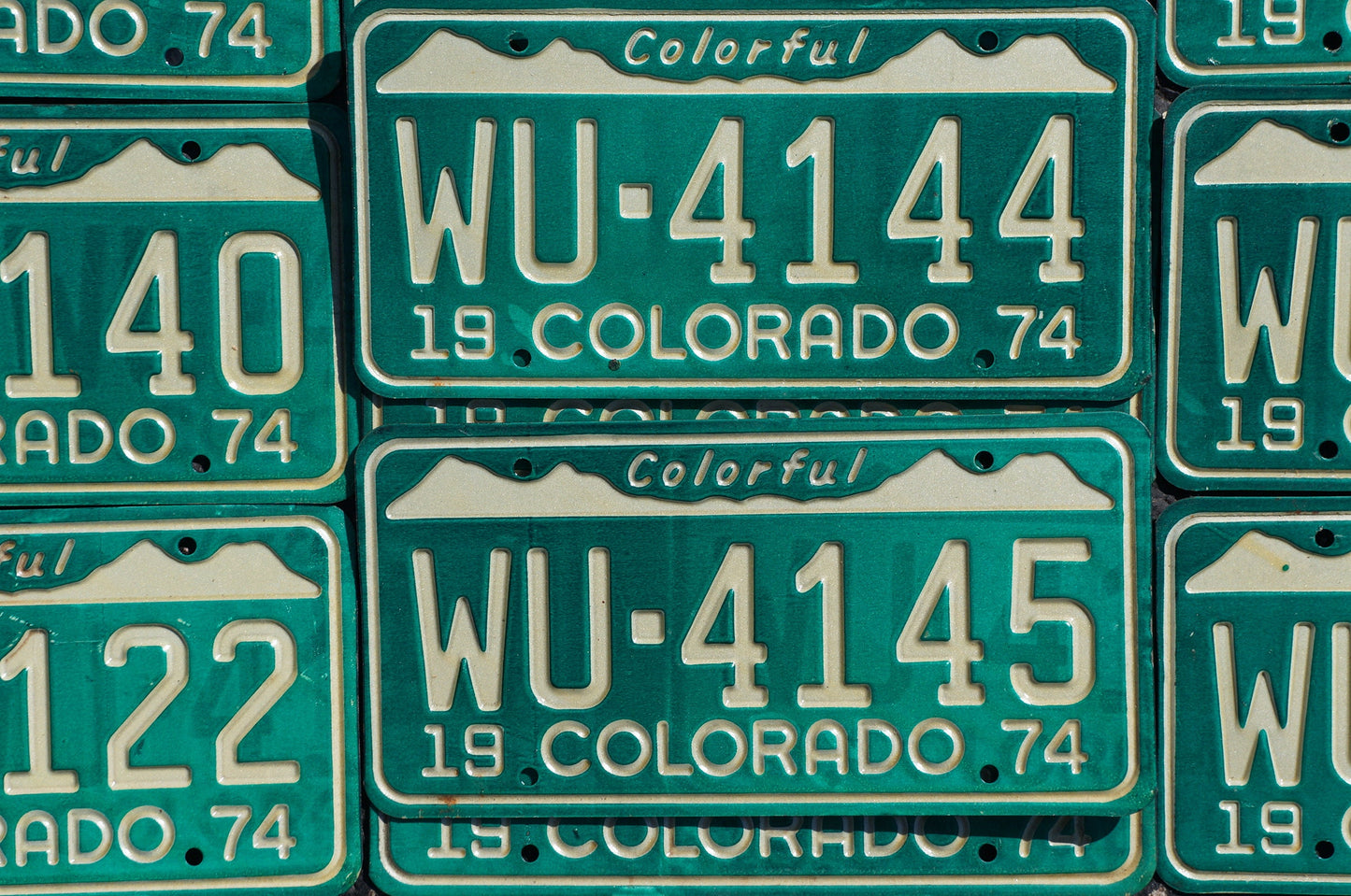 One or More - 1974 Colorful COLORADO SNOW MOUNTAINS Green License Plate