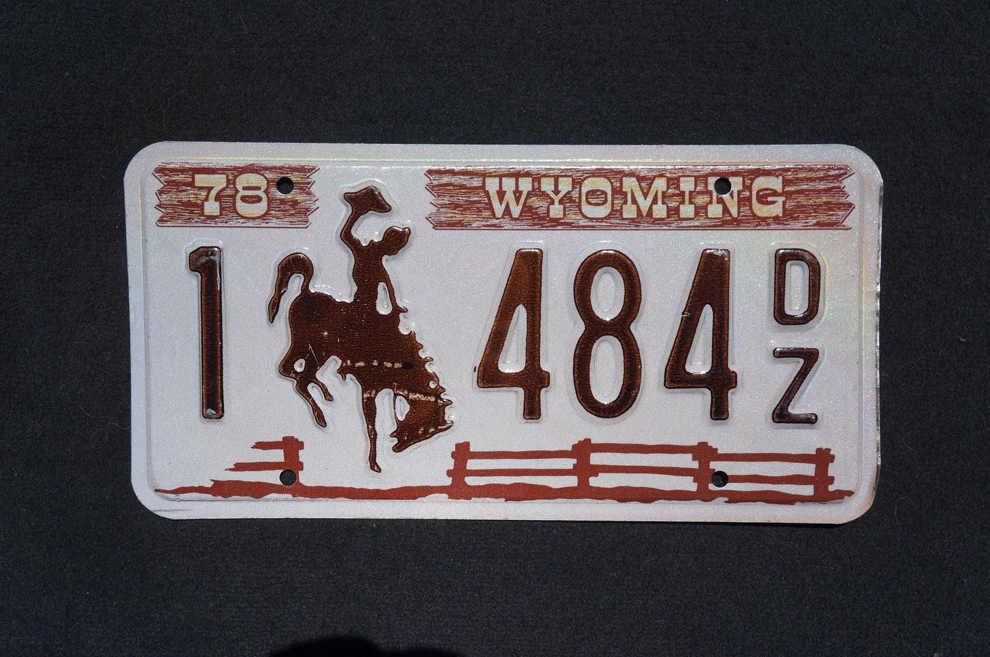 1978 Wyoming Cowboy Horse Fence Brown License Plate # 484 DZ