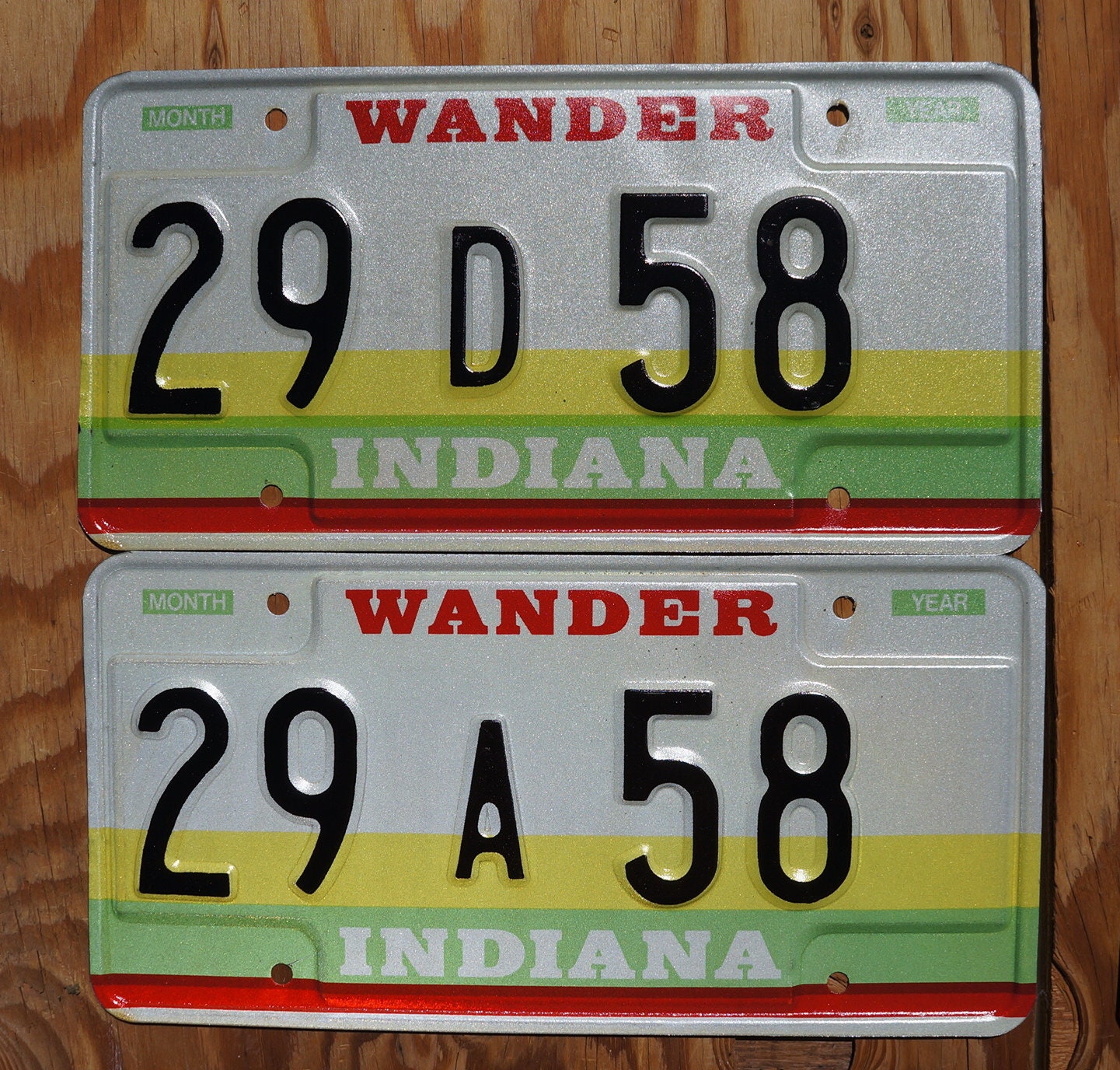 1980s Indiana Wander License Plate Pair: Yellow, Green, and Red Stripes