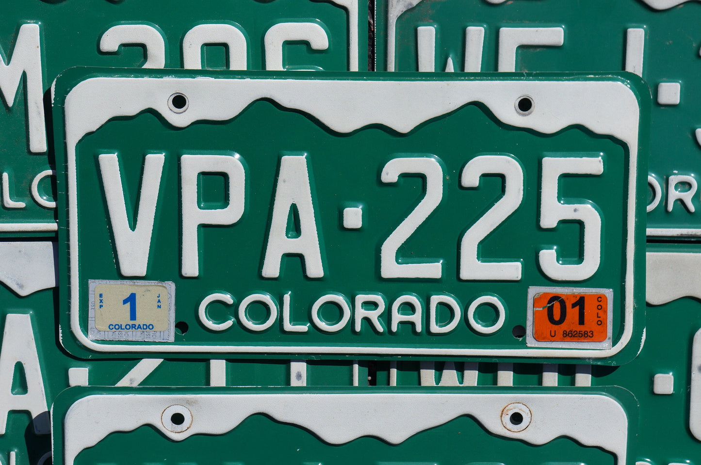 One or More - COLORADO GREEN MOUNTAINS License Plate