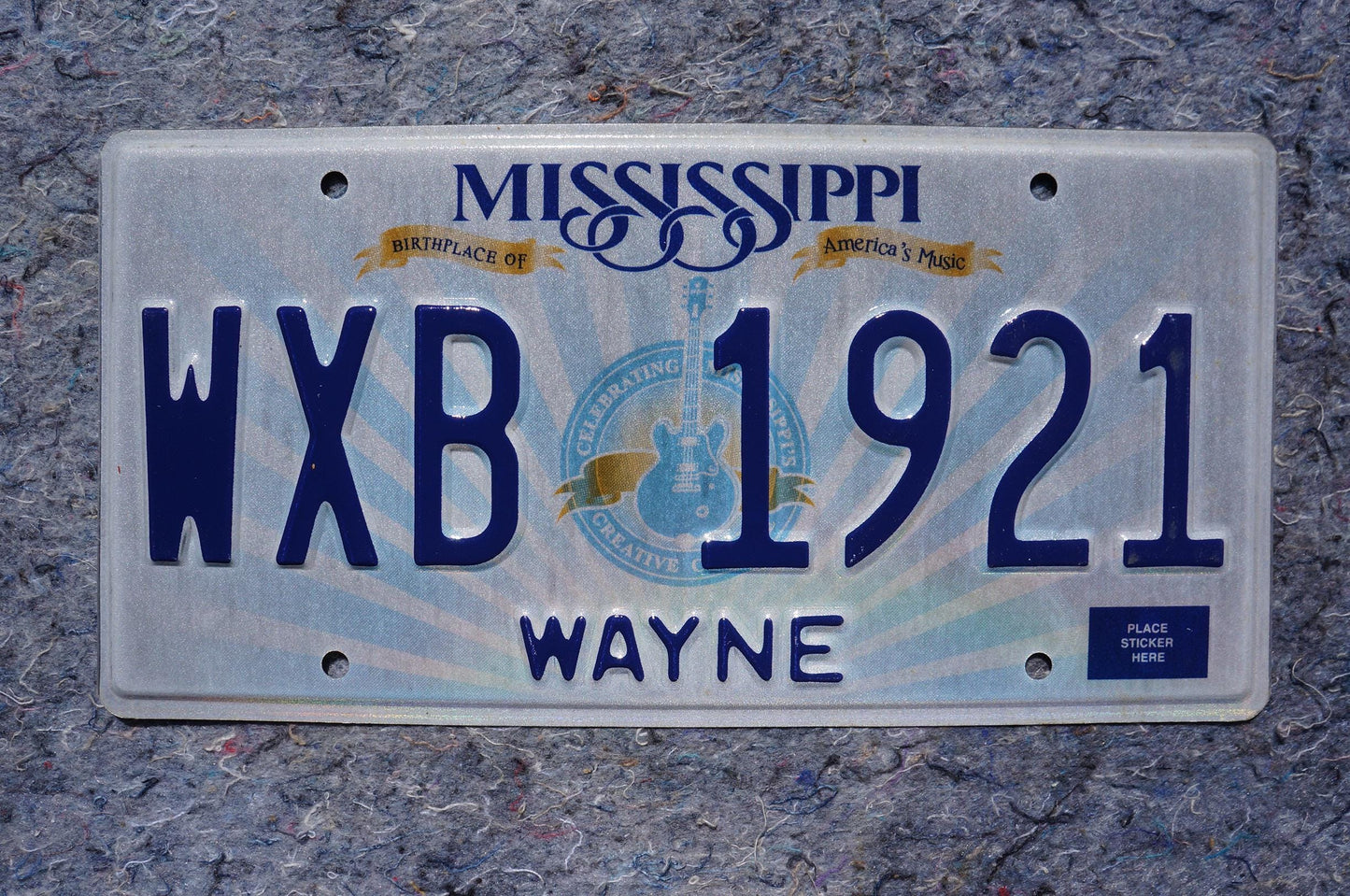 Mississippi Embossed Guitar License Plate # WXB 1921