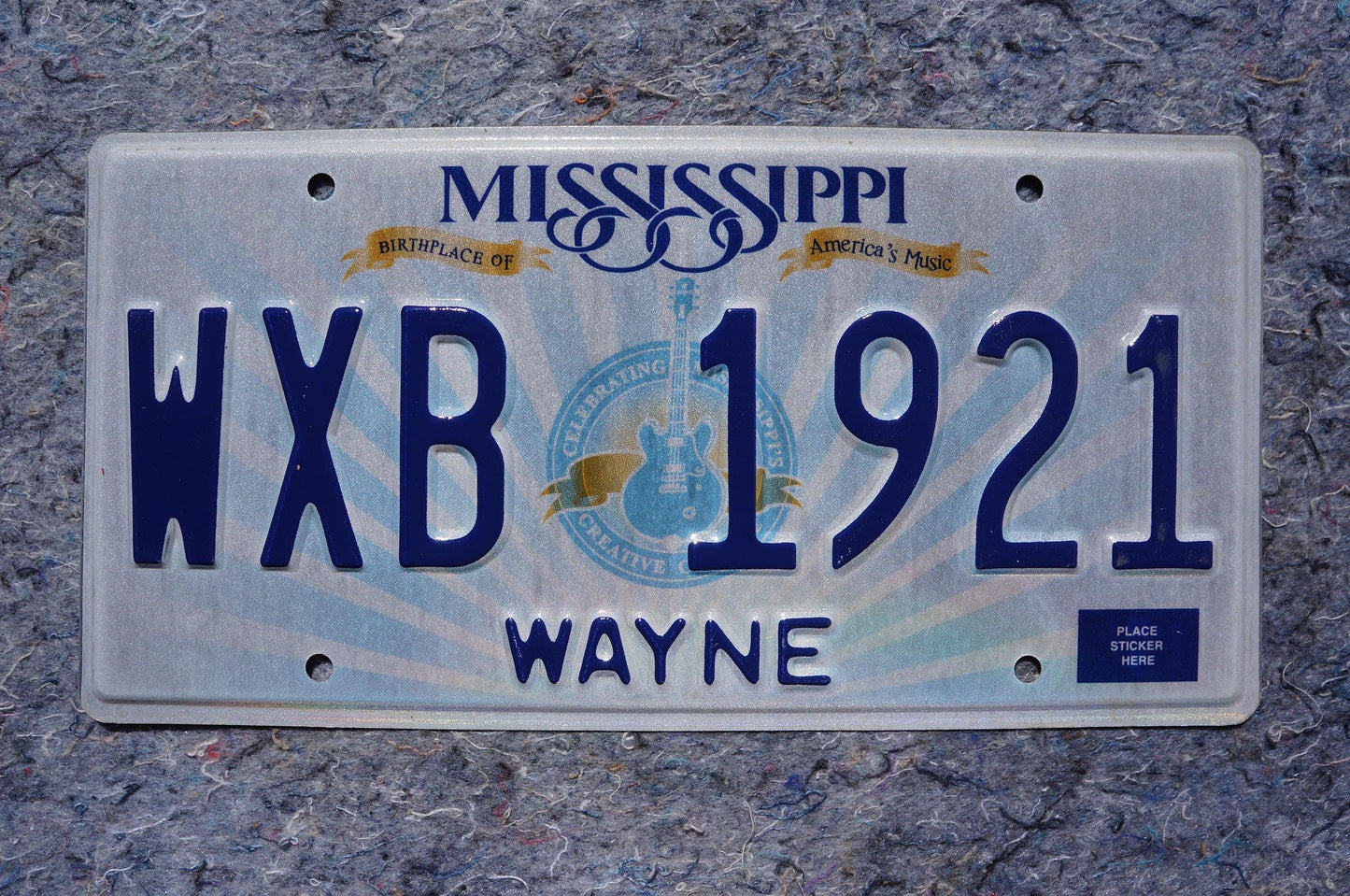 Mississippi Embossed Guitar License Plate # WXB 1921