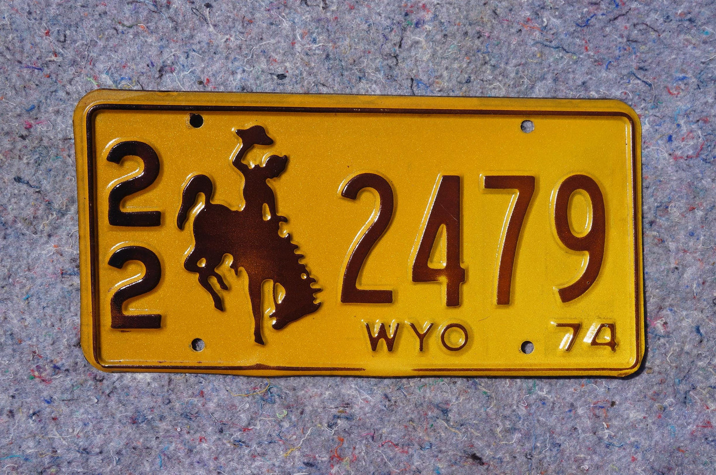 1974 Wyoming Teton County License Plate # 22 - 2479 - Cowboy & Horse - Yellowstone