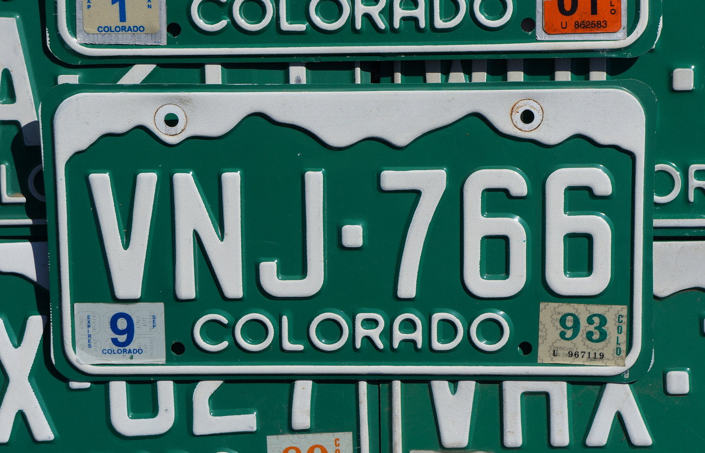 One or More - COLORADO GREEN MOUNTAINS License Plate