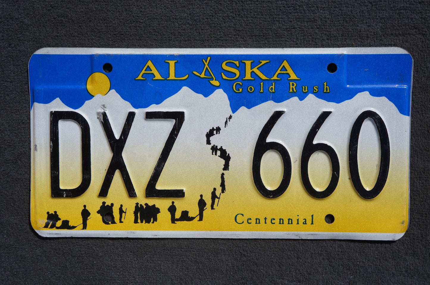 Alaska Centennial Gold Rush License Plate # DXZ 660