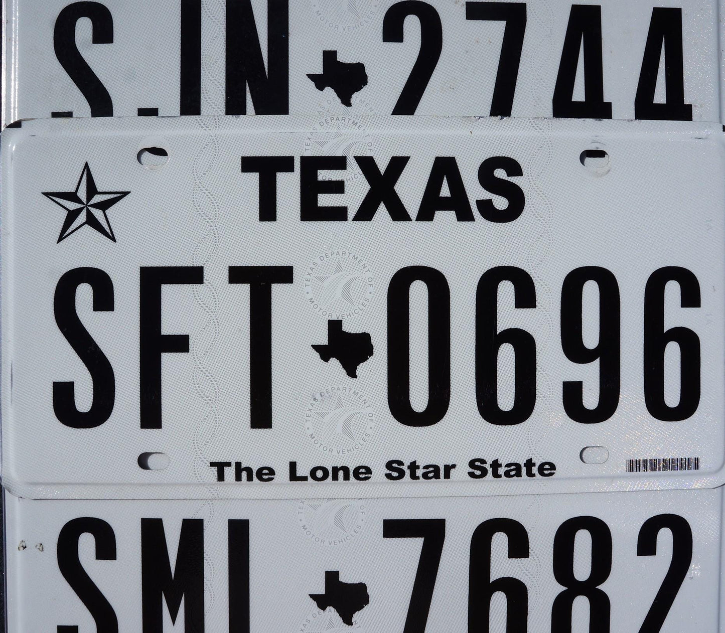 Authentic Texas License Plate: Black on White, Lone Star State Logo