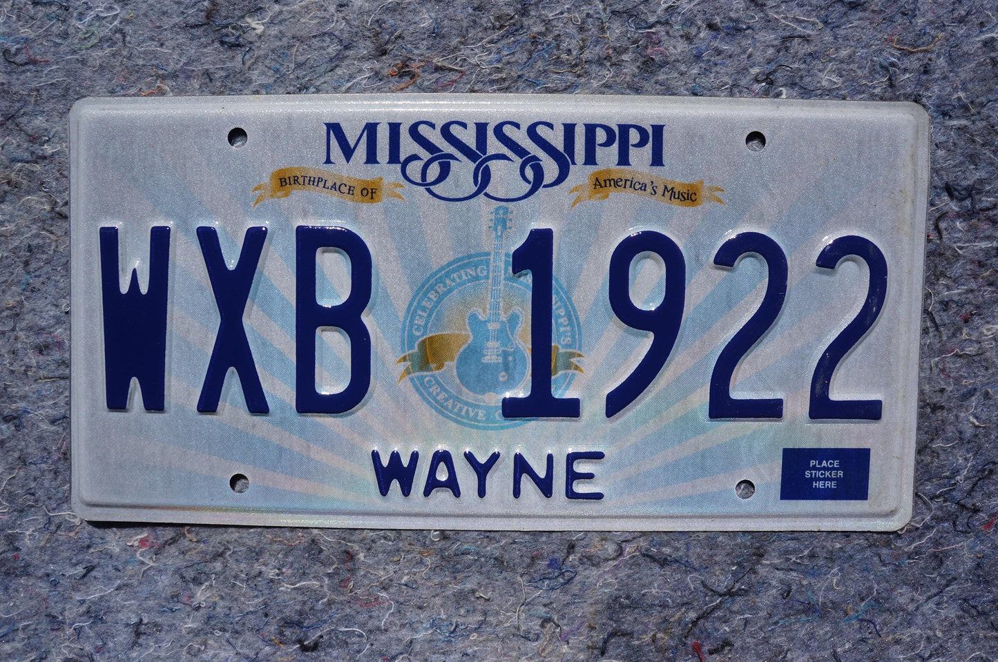 Mississippi Embossed Guitar License Plate # WXB 1922