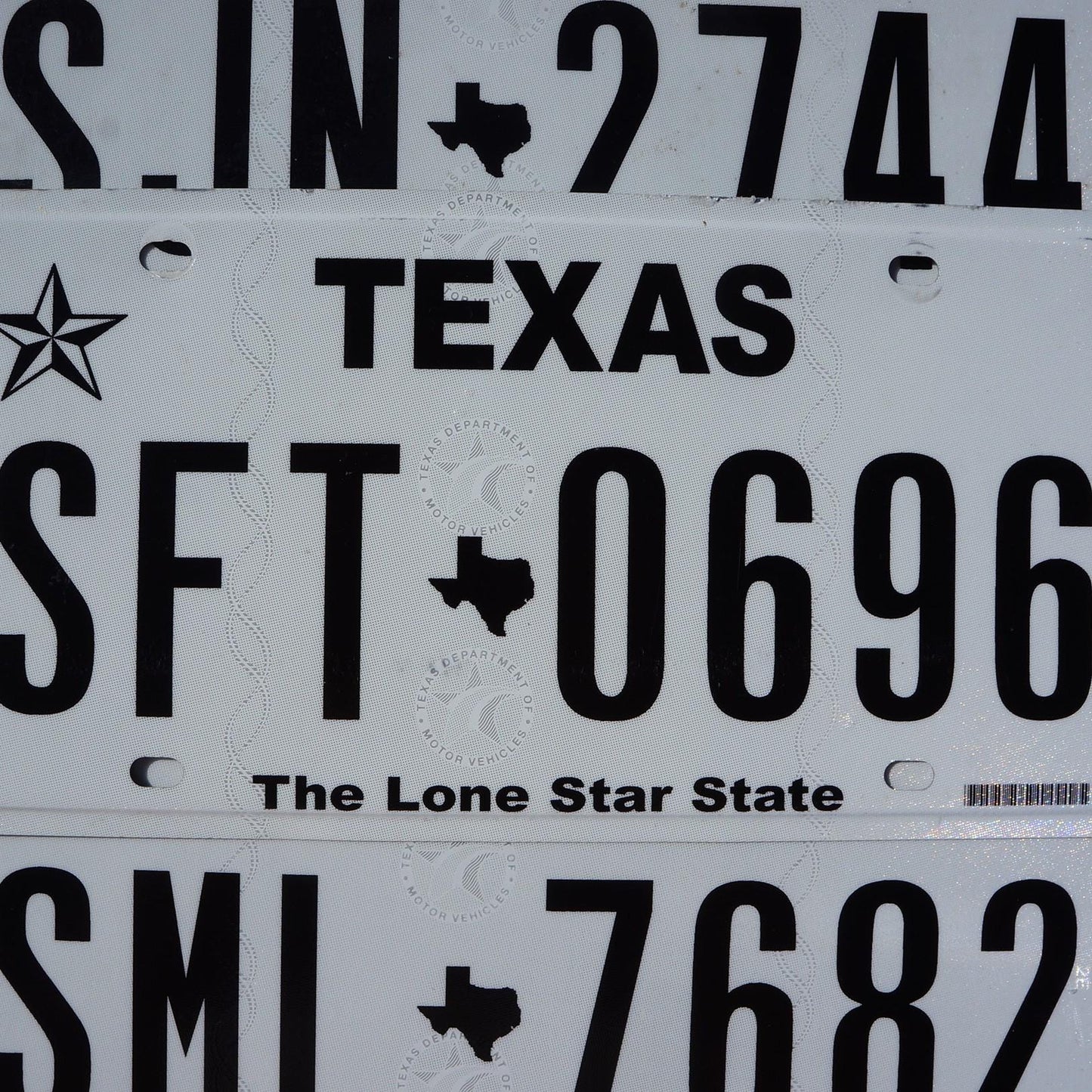 Authentic Texas License Plate: Black on White, Lone Star State Logo