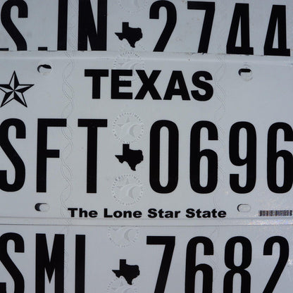 Authentic Texas License Plate: Black on White, Lone Star State Logo