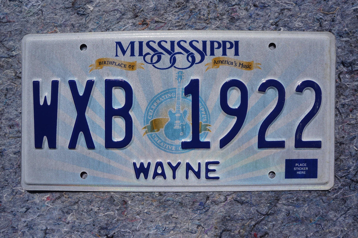 Mississippi Embossed Guitar License Plate # WXB 1922