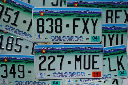 One or More - COLORADO PURPLE MOUNTAINS Truck License Plate