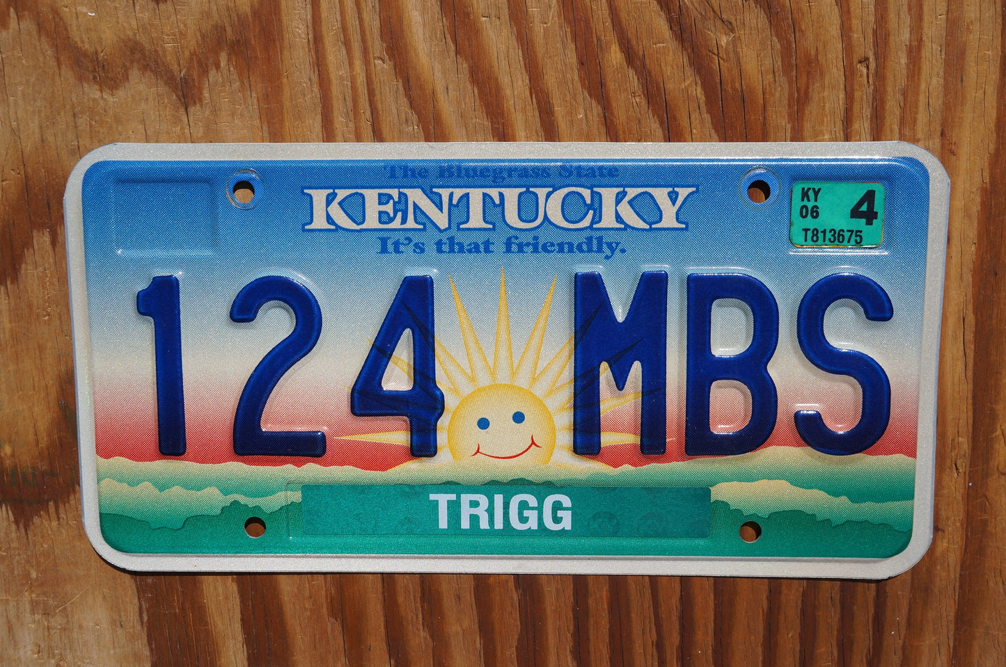 2006 Kentucky smiling sun cloud License Plate - It's that friendly