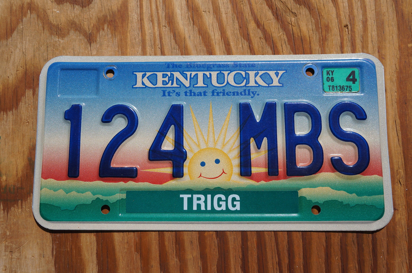 2006 Kentucky smiling sun cloud License Plate - It's that friendly