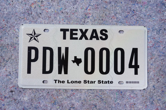 White Texas License Plate # PDW - 0004