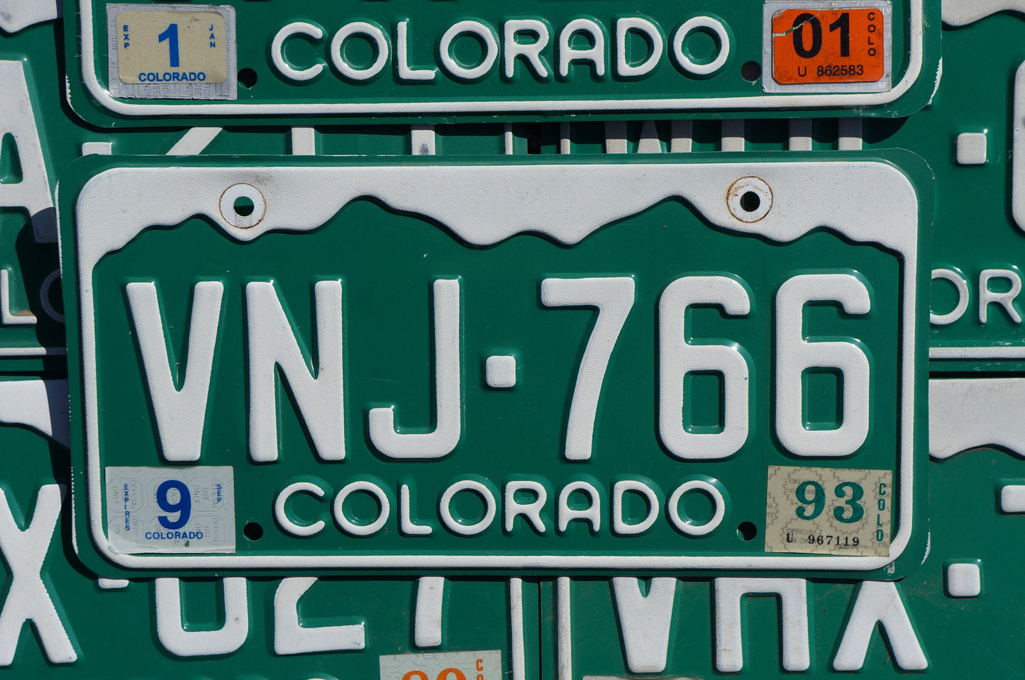 One or More - COLORADO GREEN MOUNTAINS License Plate