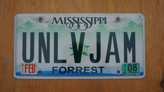 2008 Mississippi FORREST County Magnolia Flower Graphic License Plate # UNL V JAM