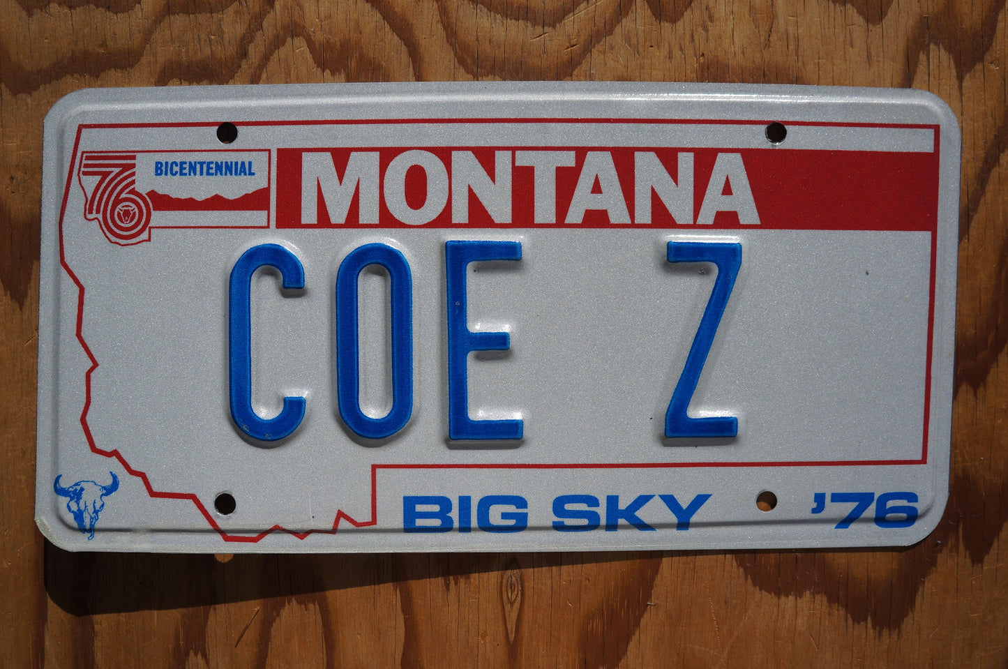 1976 Montana Cozy Vanity License Plate - COEZ