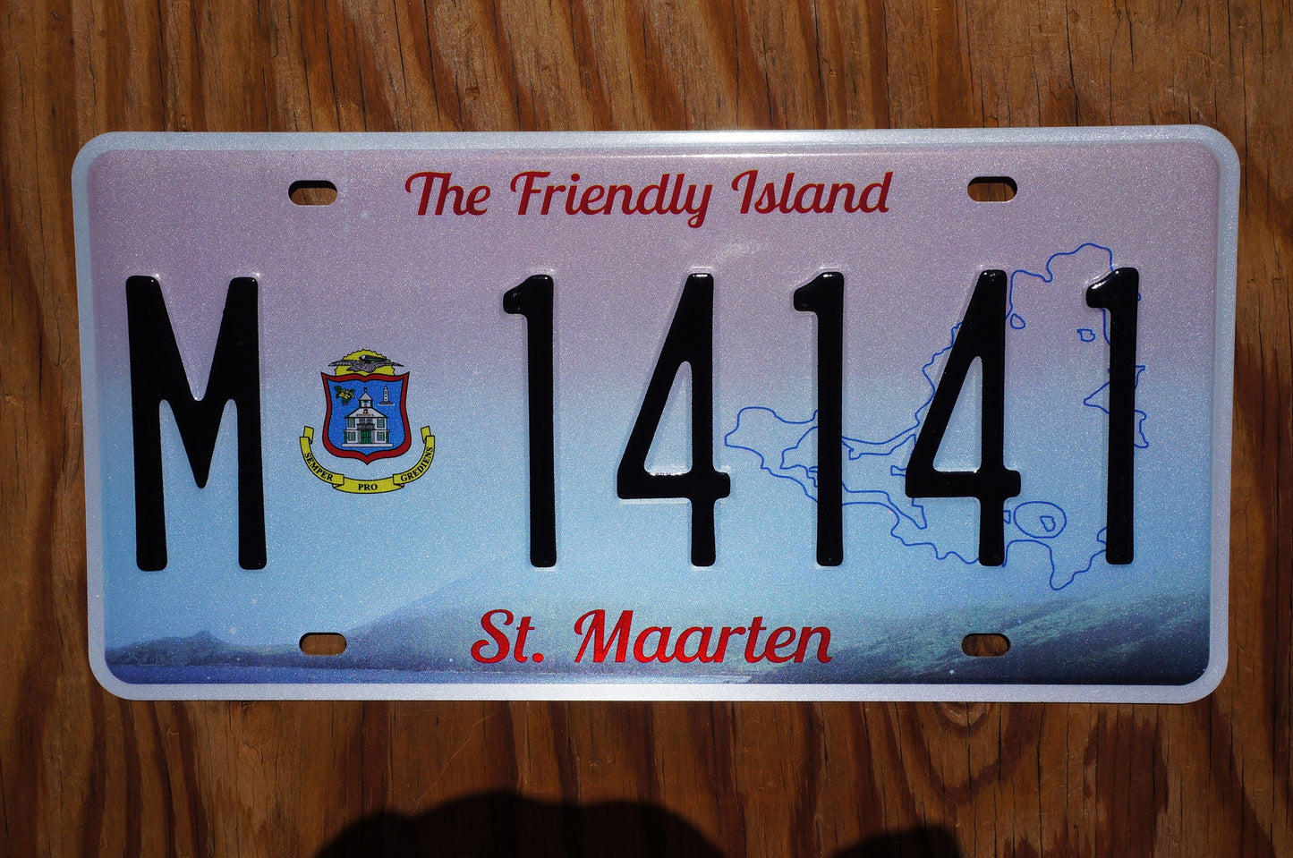 St Maarten Passenger License Plate # M - 14141 The Friendly Island, part of Netherlands Caribbean island