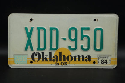 1984 Oklahoma IS OK! Yellow Sun Vintage License Plate # XDD - 950