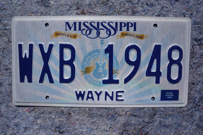 Mississippi Embossed Guitar License Plate # WXB 1948
