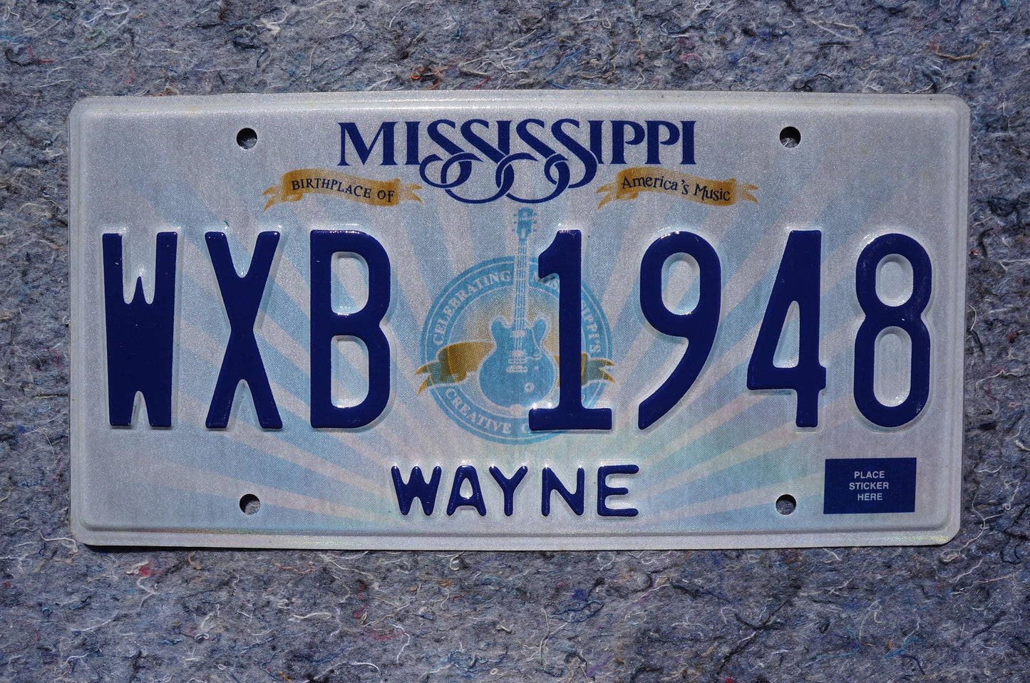 Mississippi Embossed Guitar License Plate # WXB 1948