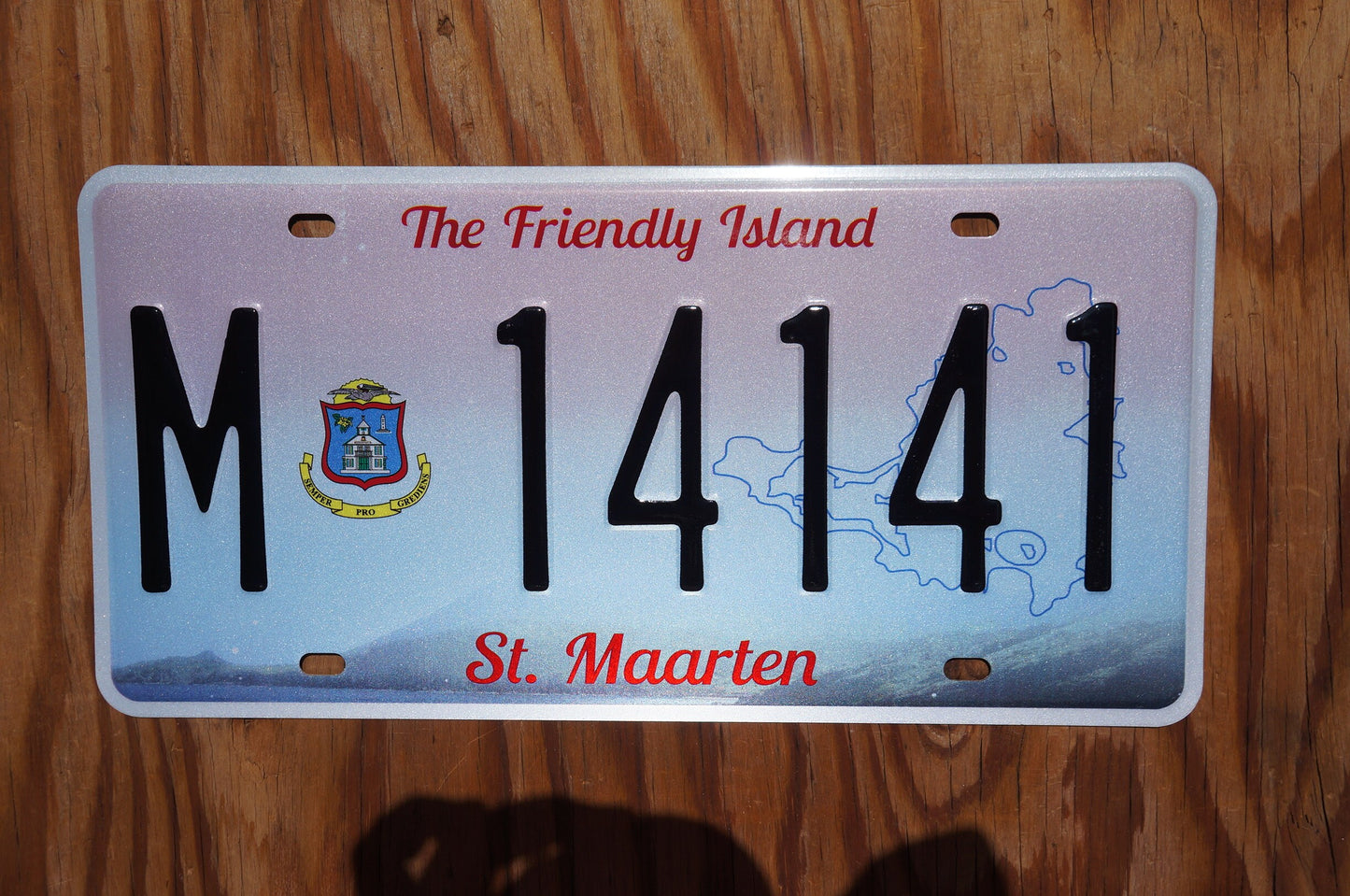St Maarten Passenger License Plate # M - 14141 The Friendly Island, part of Netherlands Caribbean island
