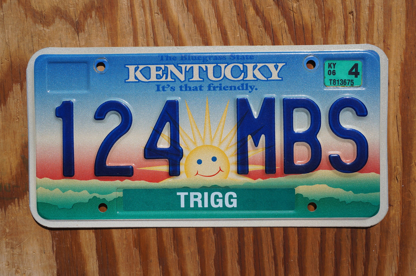 2006 Kentucky smiling sun cloud License Plate - It's that friendly