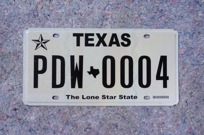 White Texas License Plate # PDW - 0004