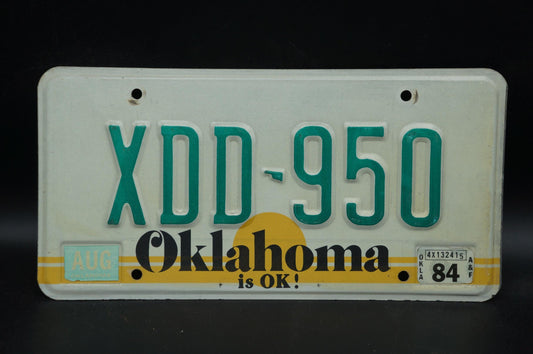 1984 Oklahoma IS OK! Yellow Sun Vintage License Plate # XDD - 950