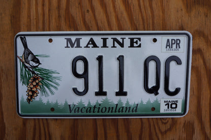 2010 Maine License Plate BIRD Pine Cone # 911 QC - Vacationland